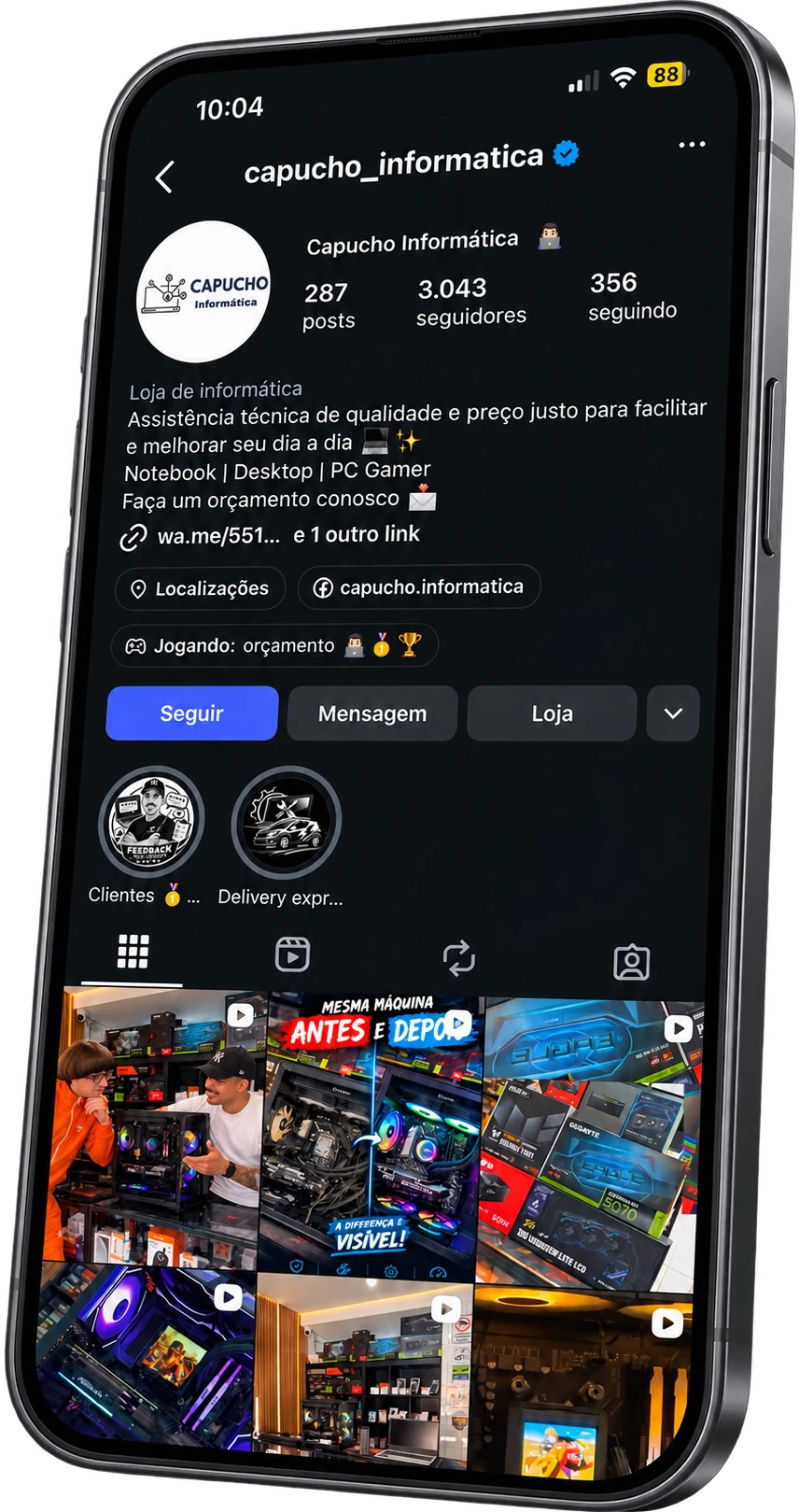 Celular mostrando o perfil da Capucho Informática no Instagram
